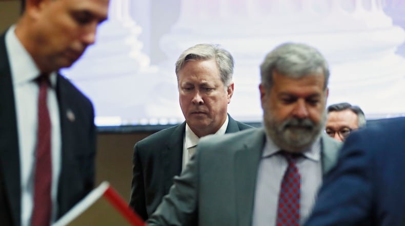 October 10, 2019 - Decatur - Robert Olsen (center) leaves DeKalb County Superior Court with attorneys. A fourth day of jury deliberations in the Olsen murder trial ended with jurors still at an impasse. Bob Andres / robert.andres@ajc.com