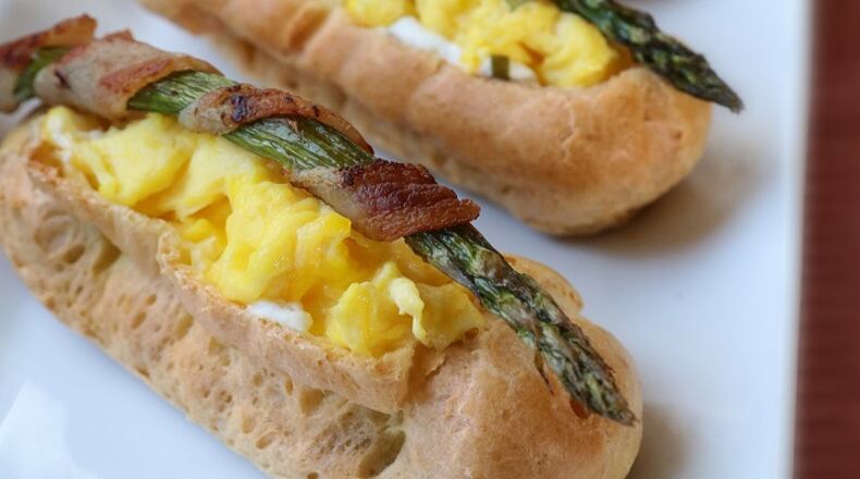 Bring something new to the Easter brunch table with savory eclairs filled with scrambled eggs and a selection of accompaniments. (Tom Wallace/Minneapolis Star Tribune/TNS)