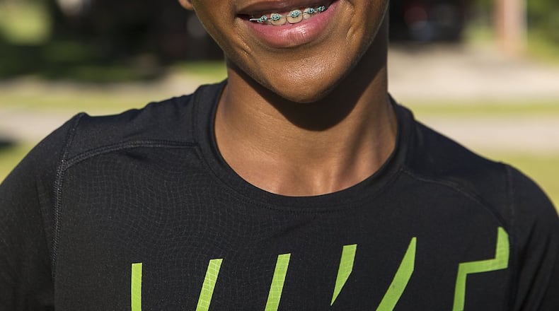 Solomon Morrow was born with a defect that left his teeth brittle and misshapen. A pediatric dentist applied a resin to fix the texture, but he needed braces to straighten the teeth. Georgia School of Orthodontics has a program called Gift of a Smile that provides orthodontic care to 13 children in metro Atlanta who cannot otherwise afford it. Morrow’s story was one that compelled the school to choose him as a participant in the program. ALYSSA POINTER/ALYSSA.POINTER@AJC.COM