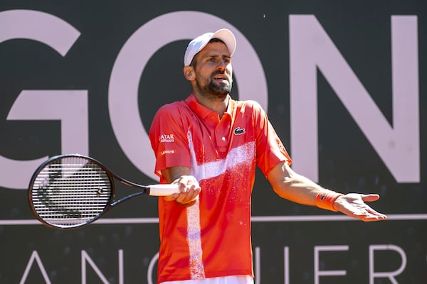 Novak Djokovic of Serbia reacts during the final match of the ATP 250 Geneva Open tennis against Hubert Hurkacz of Poland, in Geneva, Switzerland, Saturday, May 24, 2025. (Martial Trezzini/Keystone via AP)