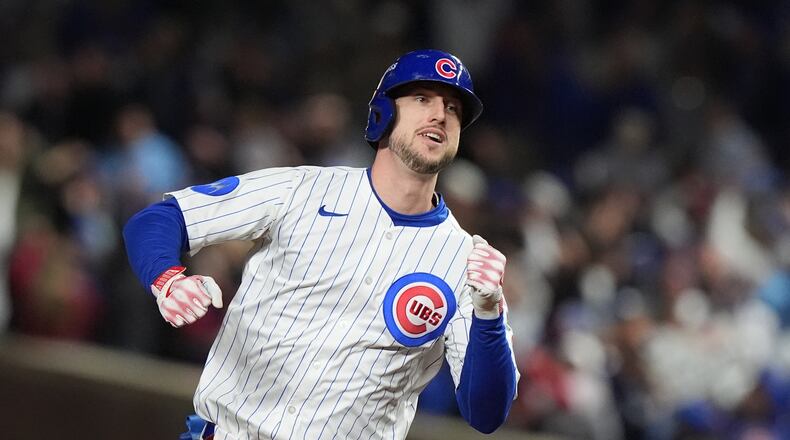 Chicago Cubs' Kyle Tucker (30) runs the bases after hitting a solo home run during the seventh inning of Game 4 of baseball's National League Division Series against the Milwaukee Brewers Thursday, Oct. 9, 2025, in Chicago. (AP Photo/Nam Y. Huh)