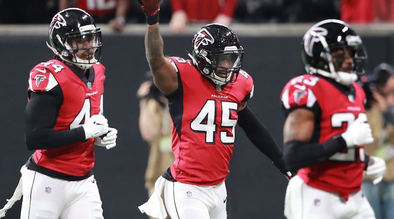 Atlanta Falcons linebacker Deion Jones celebrates intercepting Arizona Cardinals quarterback Josh Rosen and returning it for a touchdown to tie the game 7-7 during the first quarter on Sunday, Dec 16, 2018 in Atlanta, Ga. (Curtis Compton/Atlanta Journal-Constitution/TNS)