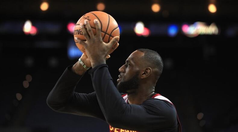 On the day after his home was vandalized with a racial slur, LeBron James scored 35 points in a loss to the Golden State Warriors in Game 1 of the NBA Finals. “(For LeBron James) being black is not a burden,” Andrew Young said. “Being exceptional is.” (Photo by Ezra Shaw/Getty Images)