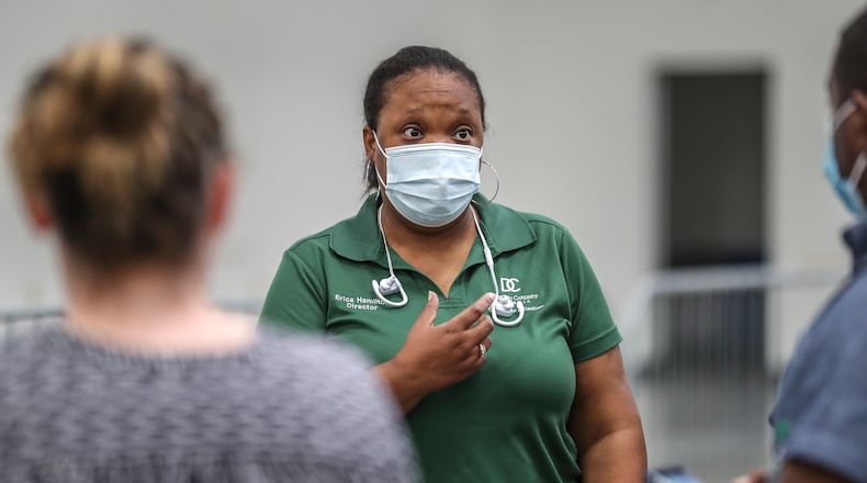 November 13, 2020 Stonecrest: DeKalb County Director of Elections, Erica Hamilton along with DeKalb County officials were in the process of setting up operations at the former Sam’s Club in Stonecrest Friday, Nov. 13, 2020, where it plans to start its part of the recount at 7 a.m. Saturday. Officials said the facility which was used as an early voting site for the election provides more space and allows for better social distancing than would be possible at the county’s elections office off Memorial Drive. Joe Biden led Donald Trump by 14,000 votes as of Friday morning. The cost of Georgia recount six-day recount isn’t known, but initial estimates from DeKalb County indicate it might be pricey. DeKalb officials said Friday the recount will cost about $180,000, including $147,000 in pay, $20,000 for food and beverages, and $12,000 for personal protective equipment and other coronavirus-related precautions. The numbers are preliminary and may change, according to DeKalb. (John Spink / John.Spink@ajc.com)