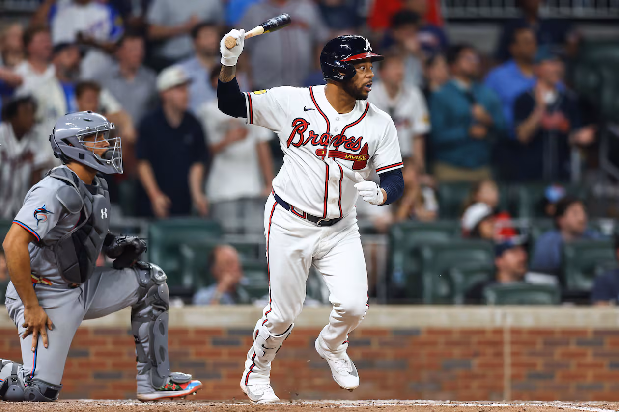 Atlanta Braves designated hitter Dominic Smith hits a bases-clearing double in the eighth inning of a baseball game against the Miami Marlins, Tuesday, April 14, 2026, in Atlanta. (AP Photo/Colin Hubbard)