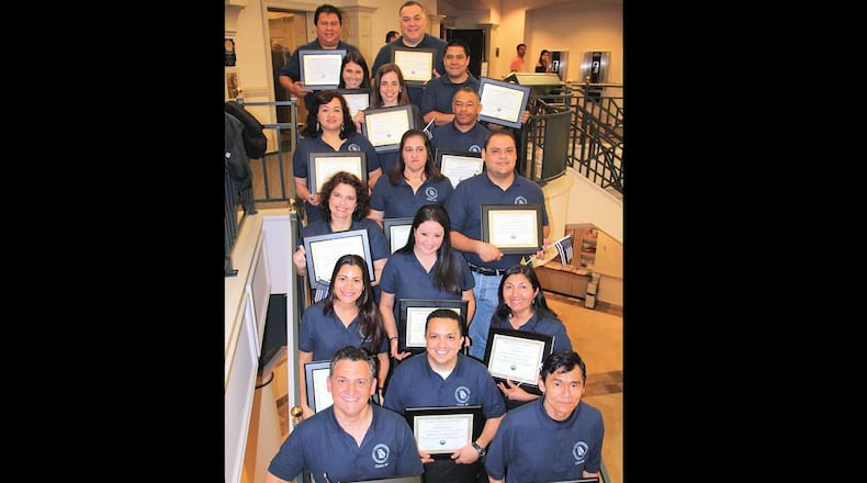These 16 people are the first graduates of Roswell's Citizen Police Academy.