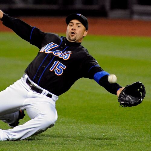 FILE - New York Mets right fielder Carlos Beltran lunges for the ball during the third inning of an MLB baseball game against the Arizona Diamondbacks, April 22, 2011 in New York. (AP Photo/Bill Kostroun, File)