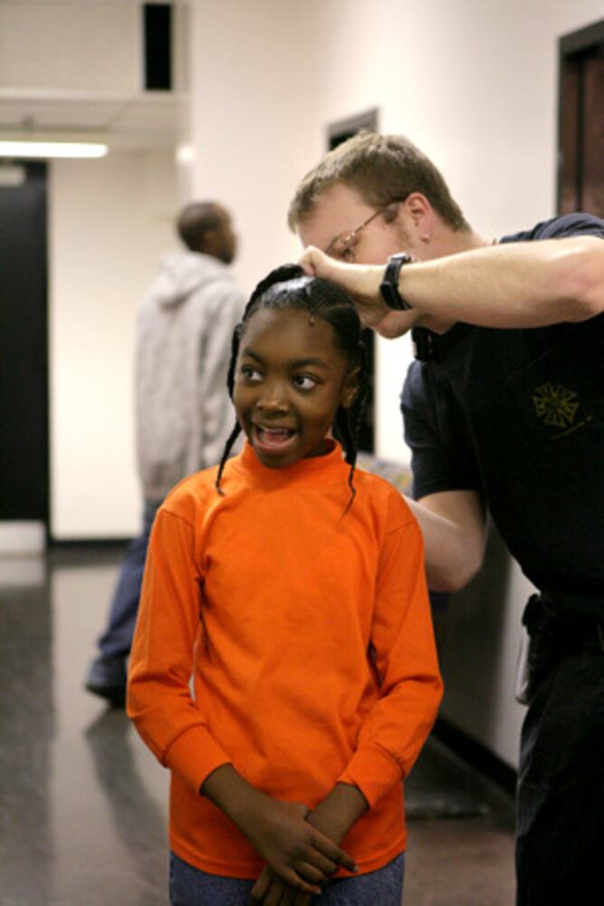 Appling girl immersed in Dr. Seuss' world