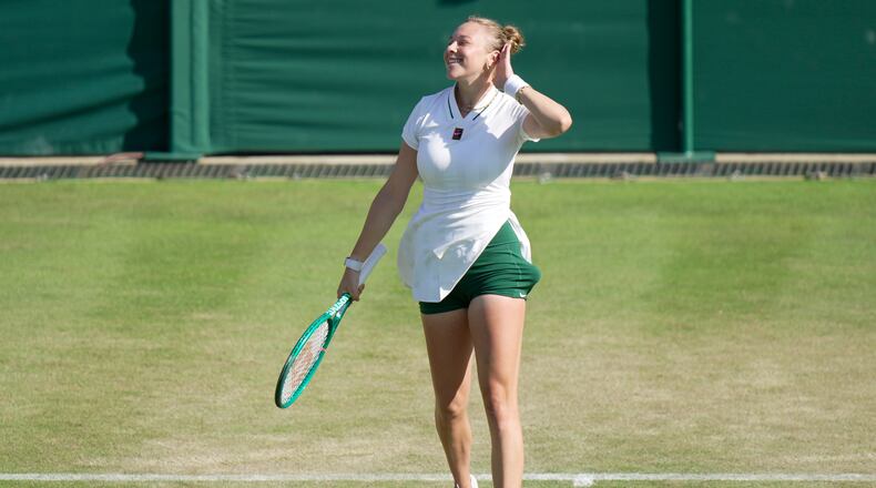 Amanda Anisimova of the United States celebrates her victory against Sofia Kenin of the United States in their second round women's singles match at the Wimbledon Tennis Championships in London, Thursday, July 2, 2026. (AP Photo/Brian Inganga)