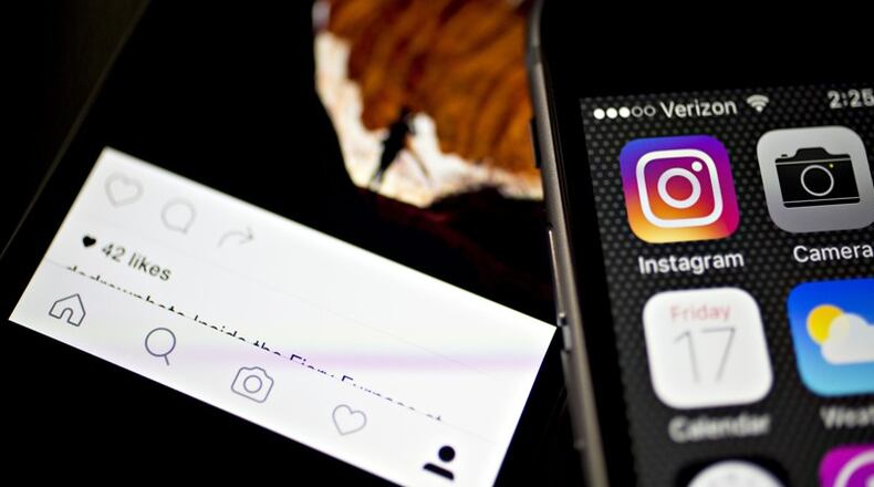 Alpharetta will work with a technology provider to create a branded app for the city for mobile devices. AJC FILE