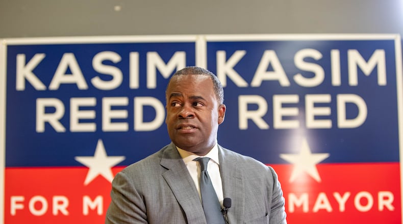 Former mayor Kasim Reed accepts an endorsement from the International Association of Fire Fighters Local 134 at Reed's campaign headquarters on Thursday, Oct. 7, 2021.  (Jenni Girtman for The Atlanta Journal-Constitution)