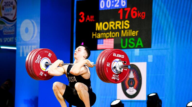 Hampton Morris completes a 176 kilogram clean and jerk, breaking the senior world record in the 61-kilogram weight class and qualifying for the 2024 Paris Olympics. He is the first American to break a senior world record in weightlifting since 1969.
