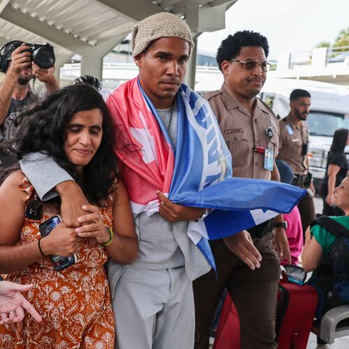 Cuban dissident artist Luis Manuel Otero Alcántara arrives at Miami International Airport on Saturday, July 18, 2026, after serving a five-year prison sentence in Cuba. (AP Photo/David Santiago)