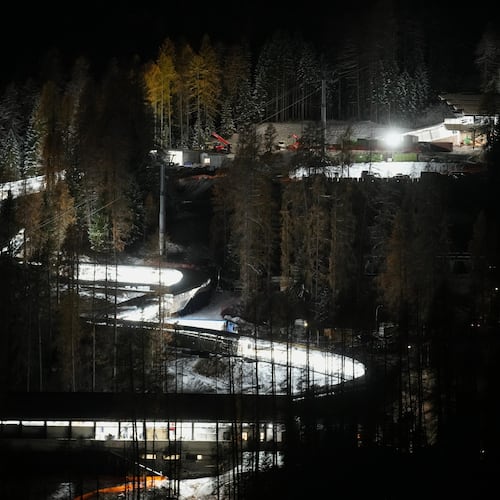 A night view of the Eugenio Monti sliding track during a three day skeleton and bobsled World Cup stage and Olympic test event in Cortina D'Ampezzo, Friday, Nov. 21, 2025. (AP Photo/Andrew Medichini)
