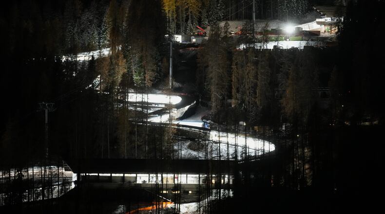 A night view of the Eugenio Monti sliding track during a three day skeleton and bobsled World Cup stage and Olympic test event in Cortina D'Ampezzo, Friday, Nov. 21, 2025. (AP Photo/Andrew Medichini)