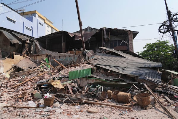 Damaged buildings are seen in the aftermath of an earthquake in Naypyitaw, Myanmar, Sunday, March 30, 2025. (AP Photo/Aung Shine Oo)