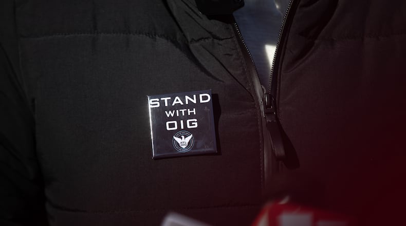 Nichola Hines, former chair of the Office of Inspector General's governing board wears a "Stand with OIG" pin as she speaks at a press conference on the steps of City Hall on Feb. 17, 2025.