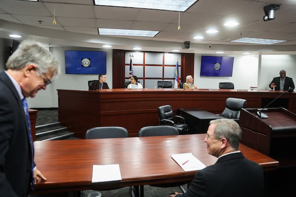 Members are dismissed after a Georgia Public Service Commission meeting in Atlanta on Tuesday, Jan. 6, 2026. For the first time in close to 25 years, there are two Democrats seated behind the dais, Alicia Johnson and Peter Hubbard. (Abbey Cutrer/AJC)