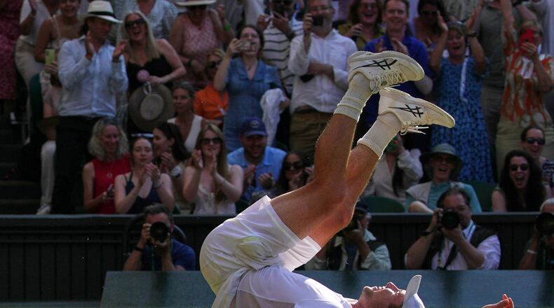 Arthur Fery of Britain reacts to winning against Flavio Cobolli of Italy in their quarter-final men's singles match at the Wimbledon Tennis Championships in London, Wednesday, July 8, 2026. (AP Photo/Brian Inganga)