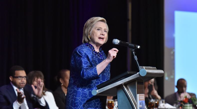 Former Democratic presidential candidate Hillary Clinton speaks Friday after she received the Southern Christian Leadership Conference’s Realizing the Dream Award during the group’s 2019 Women’s Empowerment Luncheon, part of the SCLC 61st annual convention at Hyatt Regency hotel in Atlanta. Clinton was critical of tweets President Donald Trump sent out earlier in the week saying four congresswoman of color should “go back” to their home countries. “We are better than this,” Clinton said, “but we better start proving it, not just saying it.” (Hyosub Shin / Hyosub.Shin@ajc.com)