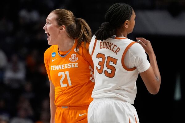 Tennessee guard Tess Darby (21) reacts after being fouled by Texas forward Madison Booker (35) during the second half in the Sweet 16 of the NCAA college basketball tournament, Saturday, March 29, 2025. in Birmingham, Ala. (AP Photo/Gerald Herbert)