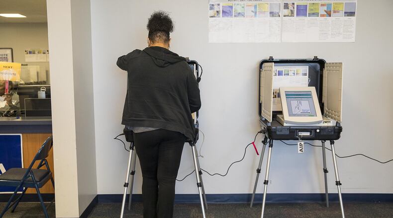 02/25/2019 — Lawrenceville, Georgia — A Gwinnett County resident participates in a special voting during early voting at the Gwinnett County Board of Voter Registrations and Elections building in Lawrenceville, Monday, February 25, 2019. The special ballot asks Gwinnett County residence to approve or disapprove a contract for provisions to expand public transportation to the county. (ALYSSA POINTER/ALYSSA.POINTER@AJC.COM)