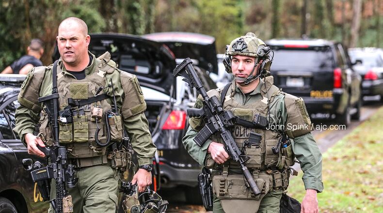 SWAT officers were called to the home near Baywind Walk after a hit-and-run suspect barricaded himself inside.