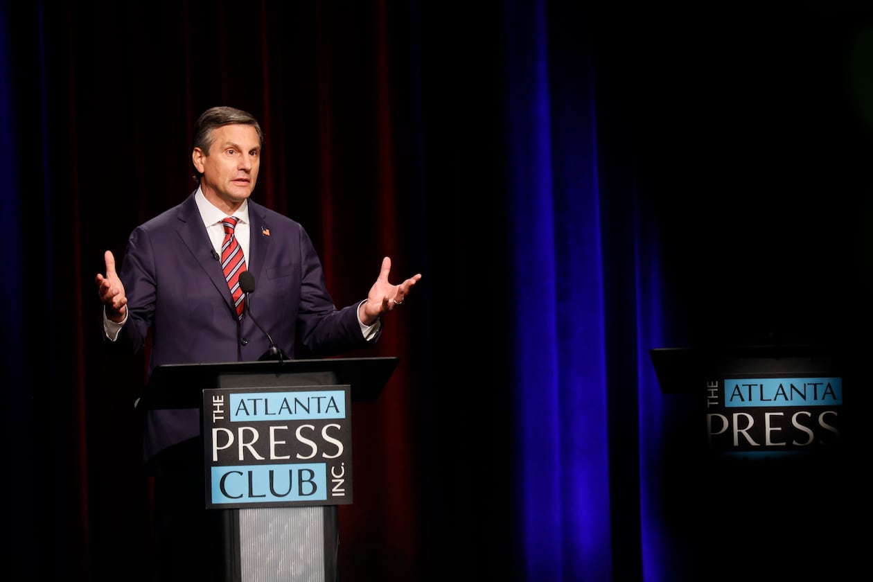 Former football coach Derek Dooley, a Republican candidate for the U.S. Senate, responds to a question at the Atlanta Press Club Loudermilk-Young debate at Georgia Public Broadcasting in Midtown on Sunday, April 26, 2026. (Miguel Martinez/AJC)