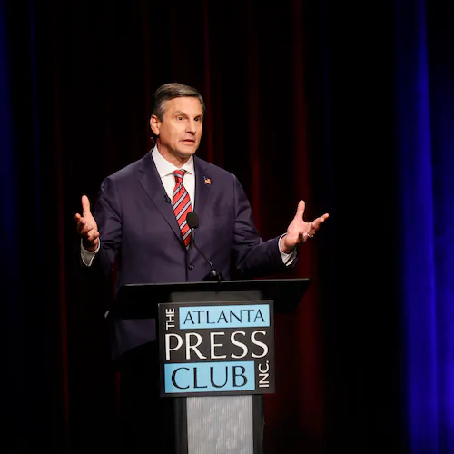 Former football coach Derek Dooley a Republican candidate for the U.S. Senate responds to a question at the Atlanta Press Club Loudermilk-Young debate for the U.S. Senate at Georgia Public Broadcasting in Midtown on Sunday, April 26, 2026. (Miguel Martinez/AJC)
