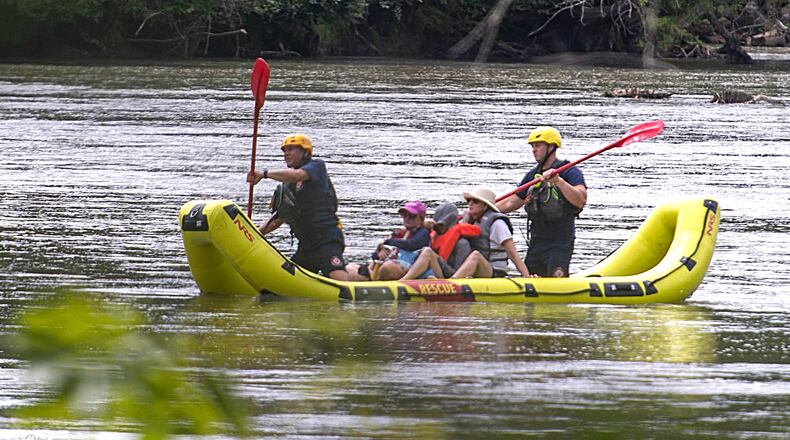 Firefighters from Cobb County save the women from Powers Island.