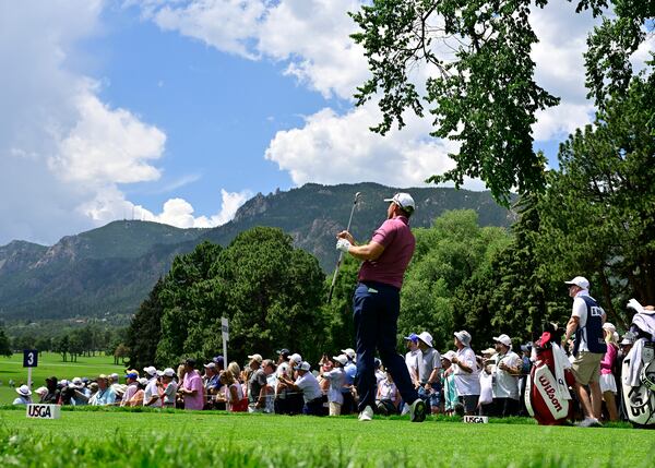 Padraig Harrington watches flight his tee shot on the fourth hole during the third round of the U.S. Senior Open Championship golf tournament at The Broadmoor, Saturday, June 28, 2025, in Colorado Springs, Colo. (Andy Cross/The Denver Post via AP)