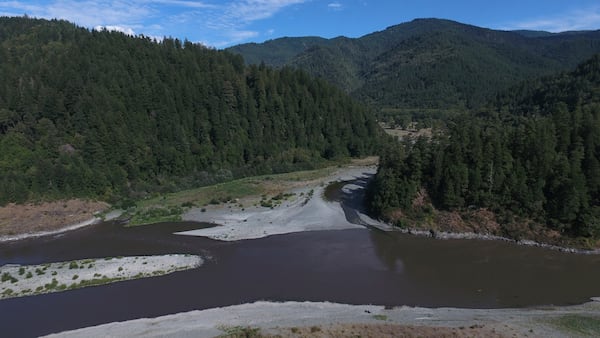 Blue Creek, center, flows into the Klamath River, Thursday, Sept. 19, 2024, in Humboldt County, Calif. (AP Photo/Godofredo A. Vásquez)