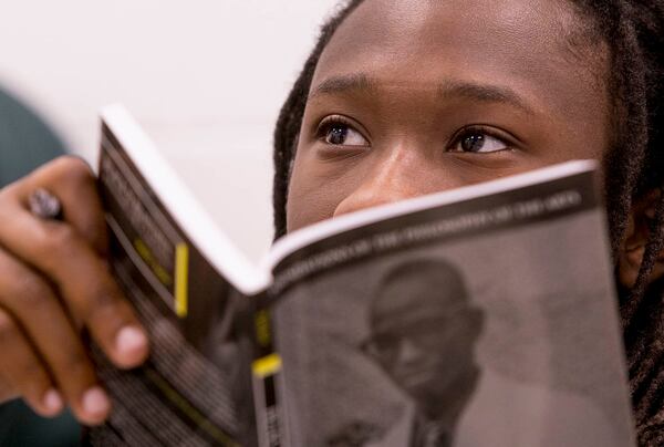 Gabriel Harold, 18, an electrical engineering major from Alexandria, Virginia, listens to his professor, Dr. Illya Davis, during an honors class of Intro to African-American Studies at Morehouse College in Atlanta on Wednesday, Nov. 15, 2017. (CASEY SYKES / CASEY.SYKES@AJC.COM)