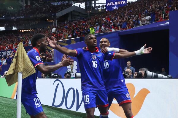 Haiti's Lenny Joseph (center) and teammates celebrate his team's first goal in the World Cup and first in 52 years, during first half of Morocco vs. Haiti Group C FIFA World Cup match at Atlanta Stadium (Mercedes-Benz Stadium) on Wednesday, June 24, 2026. (Jason Getz/AJC)