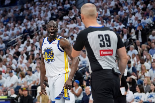 Golden State Warriors forward Draymond Green (23) reacts toward referee Tyler Ford during the second half of Game 2 of an NBA basketball second-round playoff series against the Minnesota Timberwolves, Thursday, May 8, 2025, in Minneapolis. (AP Photo/Abbie Parr)