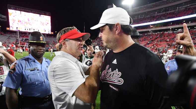 Georgia coach Kirby Smart and Mississippi State coach Jeff Lebby shake hands after Georgia beat Mississippi State during an NCAA football game at Sanford Stadium, Saturday, October 12, 2024, in Athens. Georgia won 41-31 over Mississippi State. (Hyosub Shin / AJC)