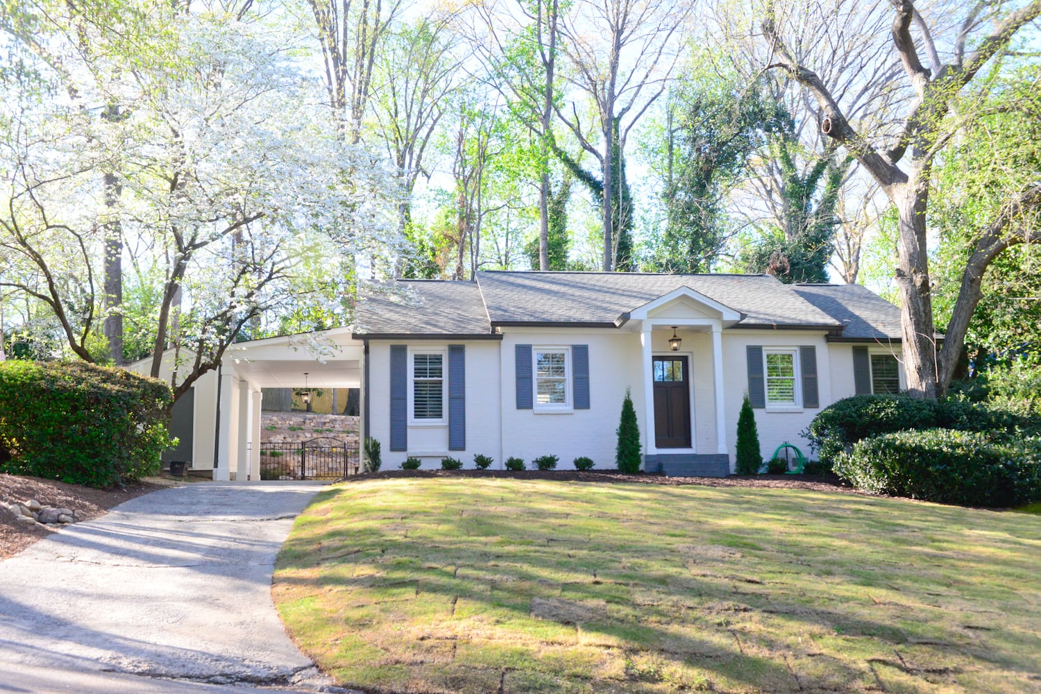 Photos: Tree crashing on kitchen spurs midcentury update in Collier Hills