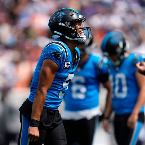 Carolina Panthers quarterback Bryce Young (9) celebrates after scoring a touchdown during the first half of an NFL football game, Sunday, Sept. 13, 2026, in Charlotte, N.C. (AP Photo/Erik Verduzco)