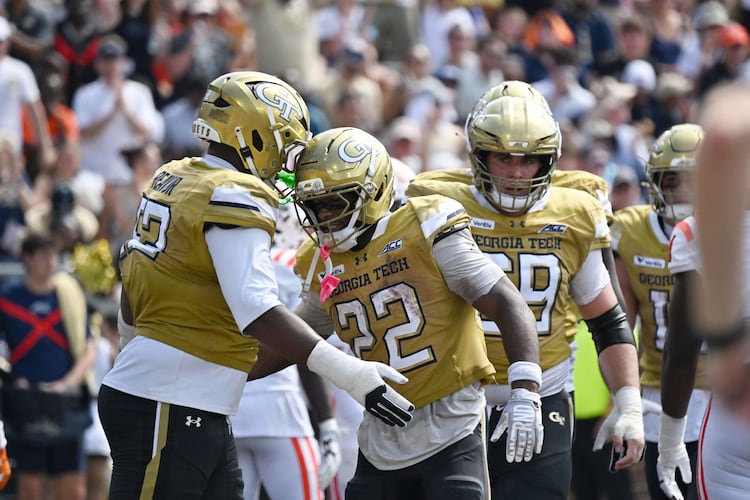Georgia Tech running back Justice Haynes (center) celebrates after scoring a touchdown during the first half in an NCAA college football game at Bobby Dodd Stadium on Saturday, Sept. 19, 2026, in Atlanta. (Hyosub Shin/AJC)