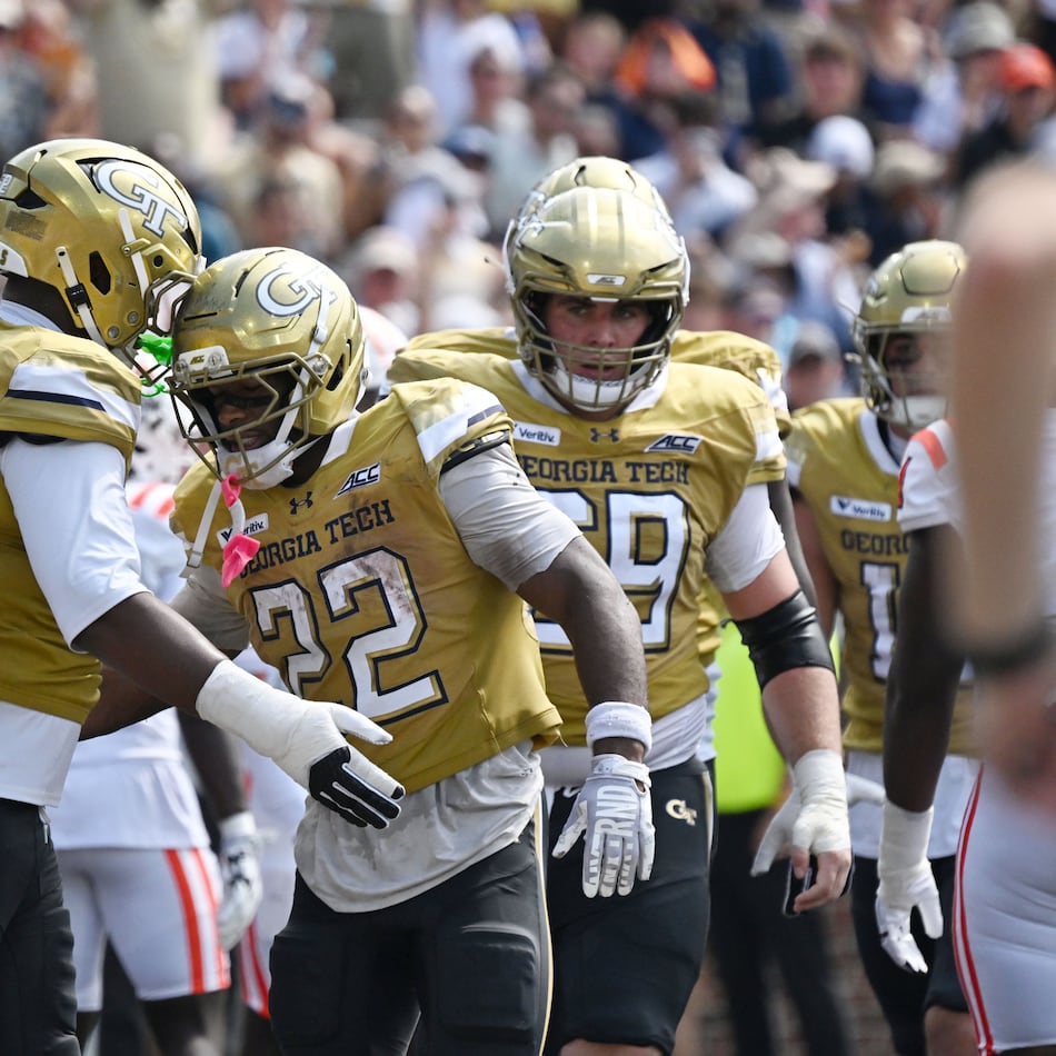 Georgia Tech running back Justice Haynes (center) celebrates after scoring a touchdown during the first half in an NCAA college football game at Bobby Dodd Stadium on Saturday, Sept. 19, 2026, in Atlanta. (Hyosub Shin/AJC)