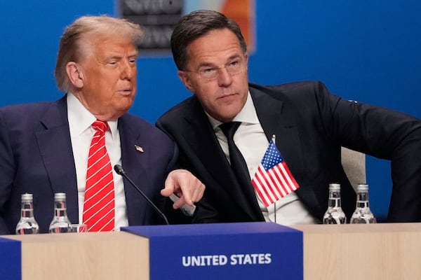 President Donald Trump and NATO Secretary General Mark Rutte attend a plenary session at the NATO summit in The Hague, Netherlands, Wednesday, June 25, 2025. (AP Photo/Matthias Schrader)
