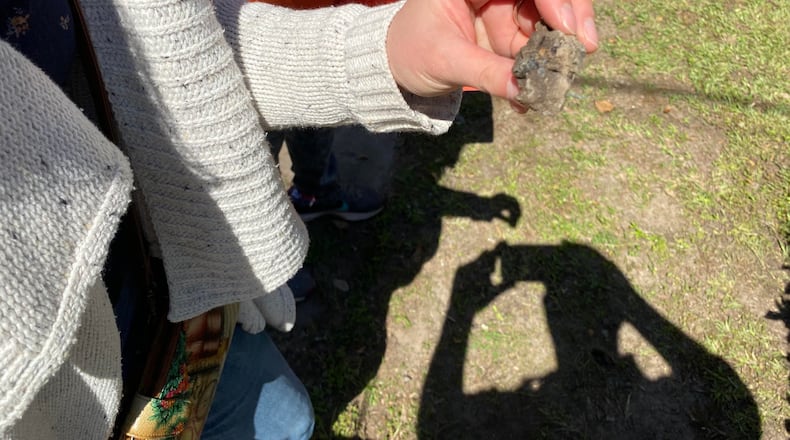 Suspected lead slag found in the yard of a west Atlanta neighborhood on May 15, 2021. ANDY MILLER / GEORGIA HEALTH NEWS