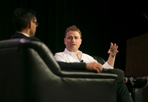 Farhad Manjoo Columnist The New York Time interviews Stewart Butterfield as he speaks about broader discussion of the market for start-ups, and how slack has calibrated its priorities, and whether tech people are saving or ruining the world during the SXSW panel 2016.  RICARDO B. BRAZZIELL/AMERICAN-STATESMAN