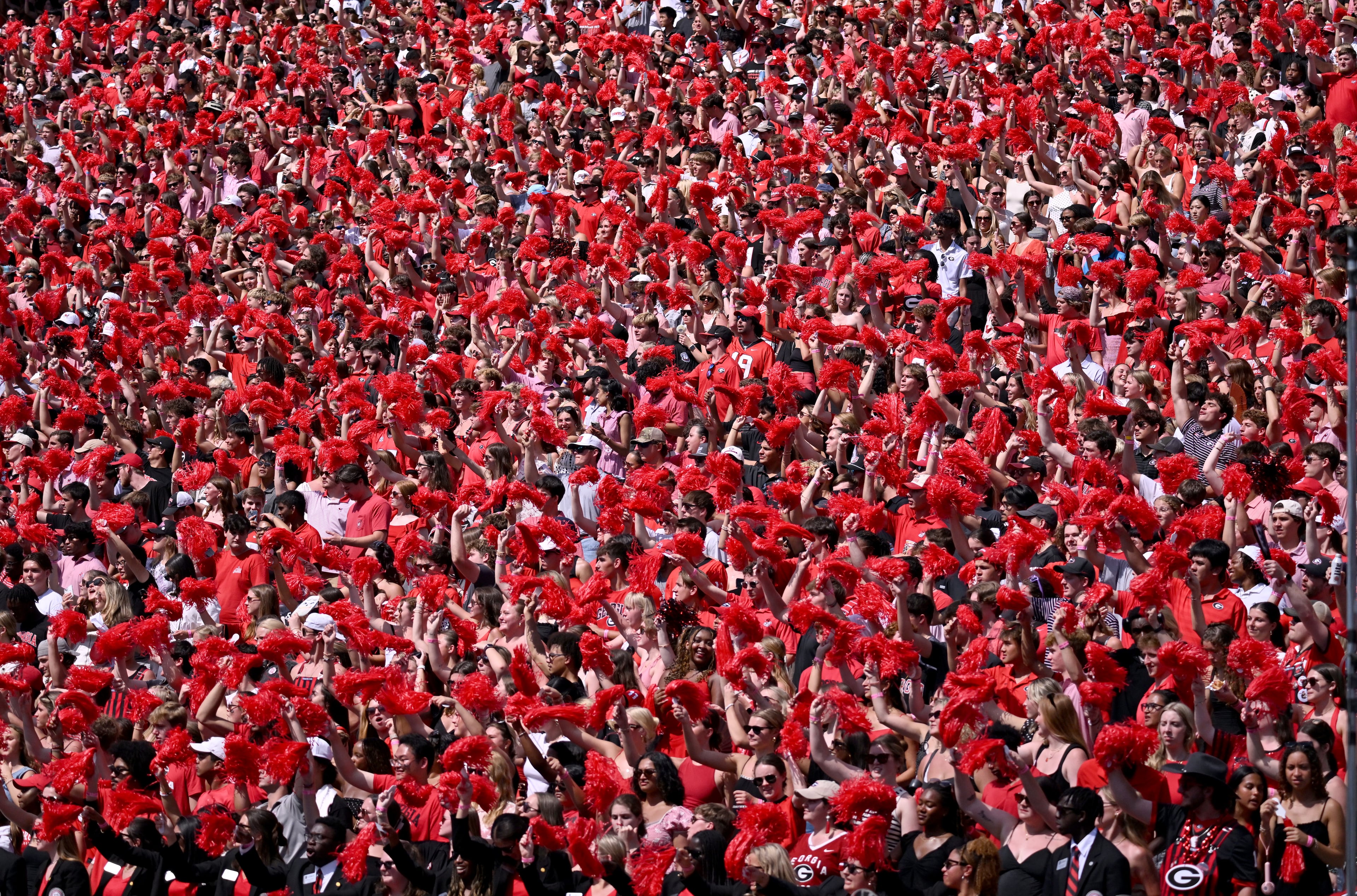 Georgia fans cheer before Georgia football's season opener and home opener against Marshall at Sanford Stadium, Saturday, August 30, 2025, in Athens. (Hyosub Shin / AJC)