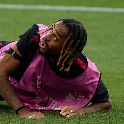 PSG's Bradley Barcola eyes the ball during a training session ahead of the UEFA Super Cup soccer match against Aston Villa in Salzburg, Austria, Tuesday, Aug. 11, 2026. (AP Photo/Darko Bandic)