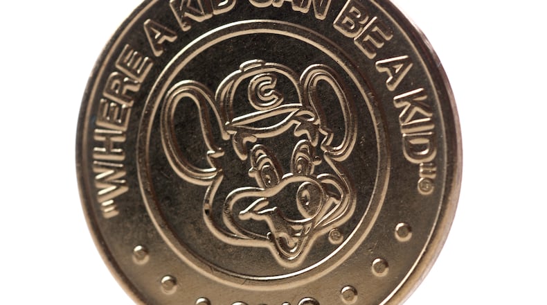 Chuck E Cheese coin or token.
