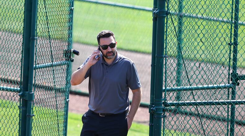 General manager Alex Anthopoulos working the phone. (Curtis Compton/ccompton@ajc.com)