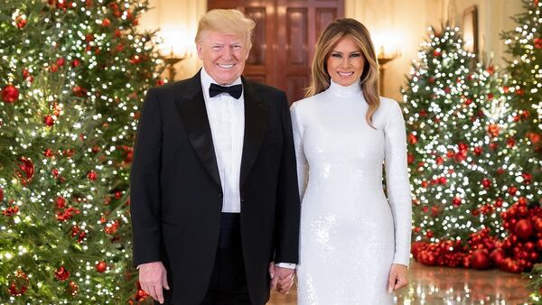 President Donald J. Trump and First Lady Melania Trump are seen in their Official Christmas Portrait on Saturday, December 15, 2018, in the Cross Hall of the White House.