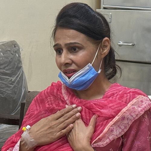 Nurse Razia Noreen, who risked her life to save a newborn during a fire at the Pakistan Institute of Medical Sciences, speaks during an interview in Islamabad, Tuesday, Sept. 1, 2026. (AP Photo/M.Yousaf)