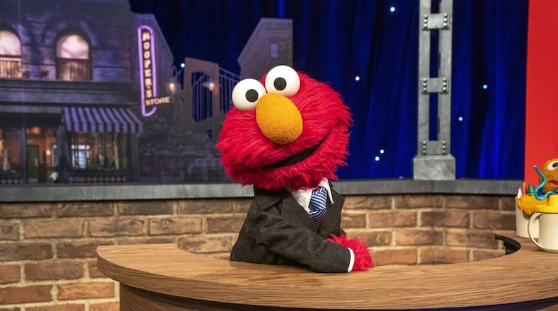 This image released by Sesame Workshop shows muppet character Elmo, who will host a family friendly show called “The Not Too Late Show with Elmo.” It begins streaming May 27 on HBO Max. (Richard Termine/Sesame Workshop via AP)